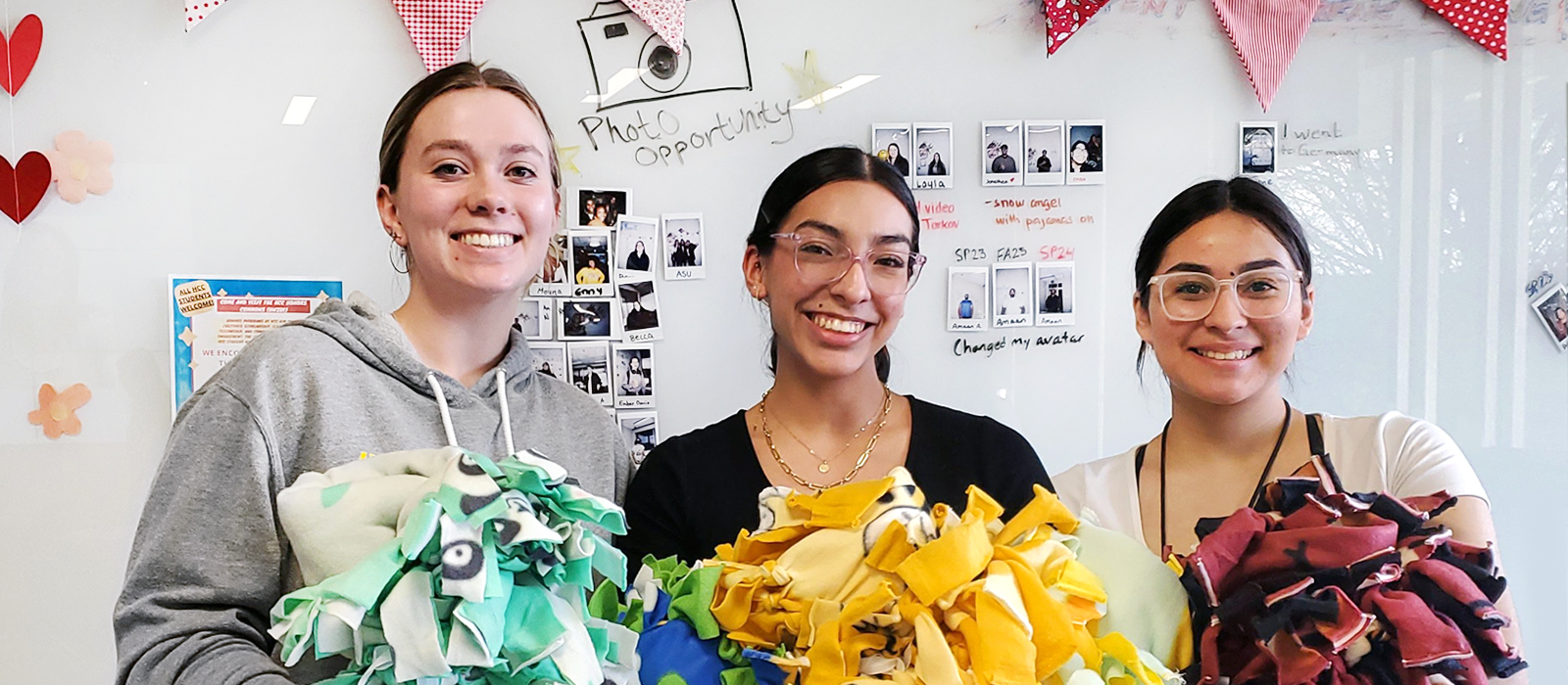 Three smiling and enthusiastic young ladies representing the Schoenbrodt Program.