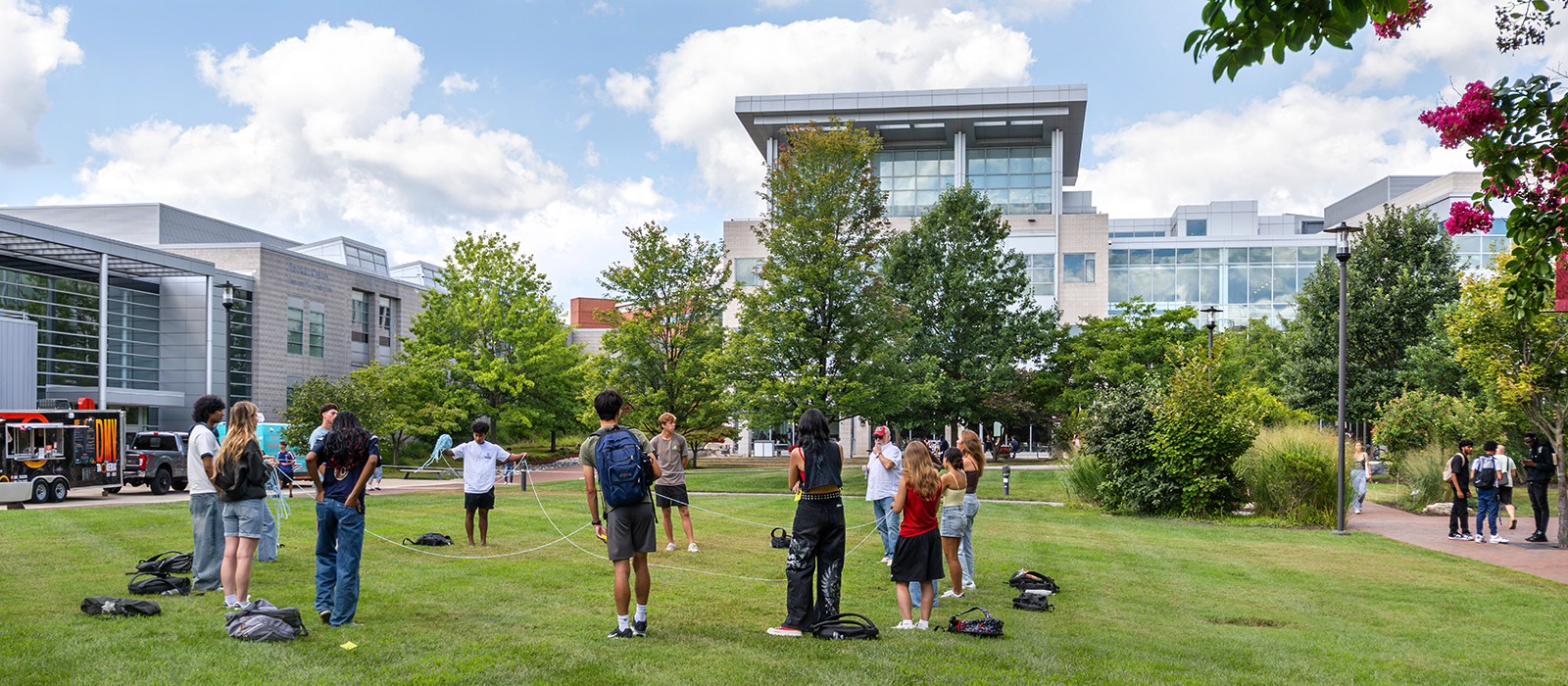 Howard Community College students connect during an outdoor campus activity on the quad.